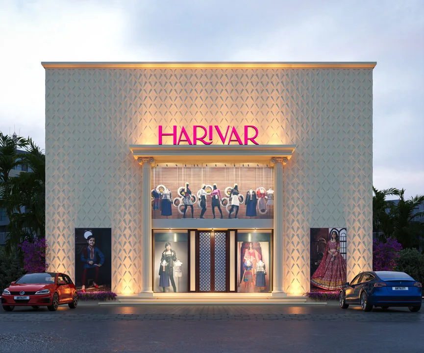 Exterior of ARTILETT-designed retail showroom at dusk, featuring textured facade panels, classical portico entrance, illuminated pink 'HARIVAR' sign, and large display windows with mannequins.