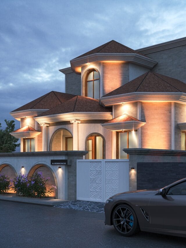 showing more of the driveway and landscaping at dusk. A dark grey car is parked on the paved driveway in the foreground. The house has a white gate on the right side and shows more of its architectural details, including the textured stone walls and warm interior lighting. The twilight sky has some soft clouds.