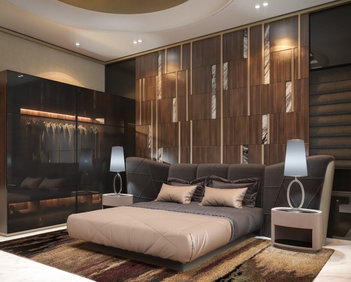 Modern master bedroom with upholstered platform bed, walnut and marble feature wall, gloss wardrobe, and warm layered lighting by Artilett